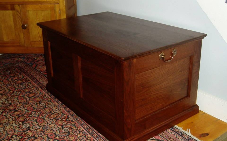 A frame and panel walnut toybox with bookmatched panels