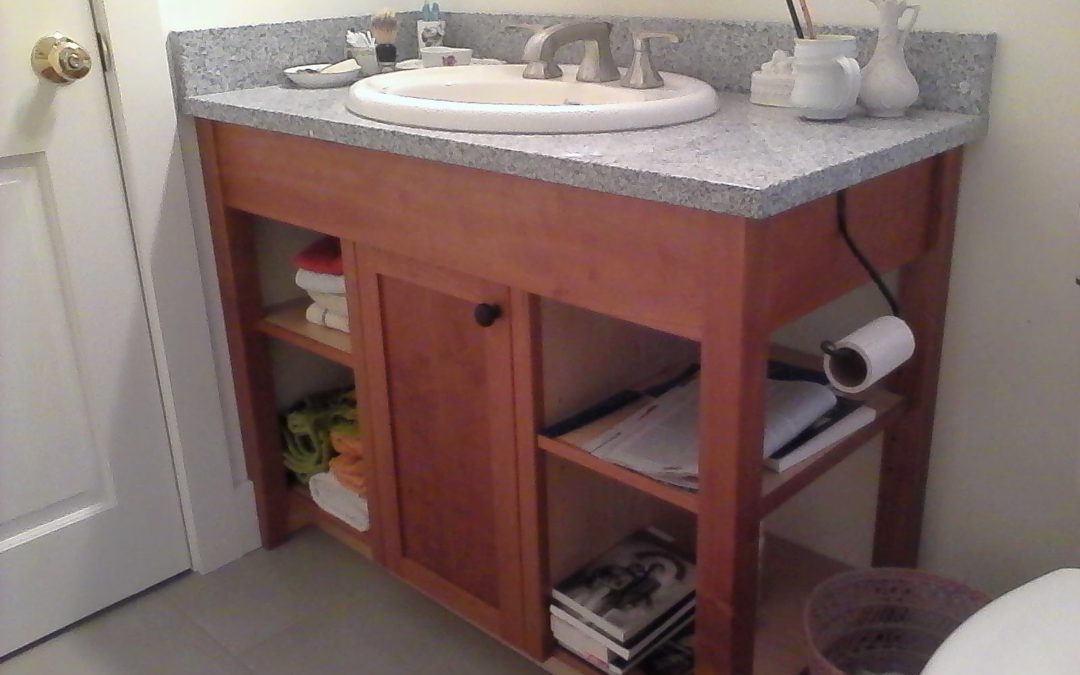 A modified open stand cherry vanity.